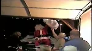 Drunnk Santa roof jump mishap.