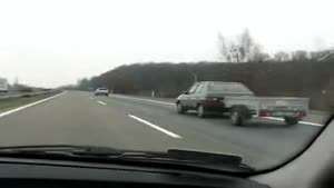 Guy driving wrecked car 