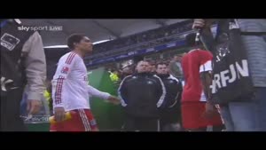 Angry soccer player throws bottle