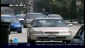 American cops push car off the road.