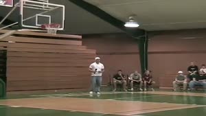 Idiot gets stuck in basketball net