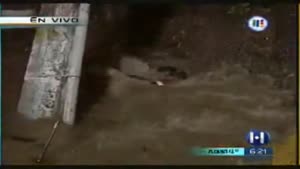 Reporter falls in filthy water.