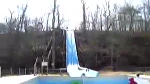 Kid Takes Waterslide Into Empty Pool