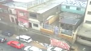 Wall Falls On Top Of Parked Cars