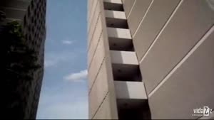 Fearless Man Climbs High Building