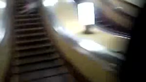 Kid Smashes Escalator Lamp With Head