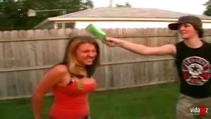 Guy Breaks Bottle On Girfriend's Head