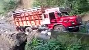 Indian Landslide Takes Down Truck