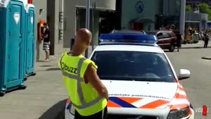 Dutch Guy Pisses On Police Car