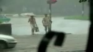 Pedestrians Trying To Cross The Street