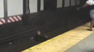 Girl Jumps On Tracks NYC Subway