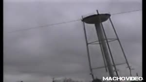 Water Tower Crushes House