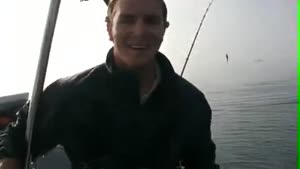 Fisherman Falls Overboard With Shark