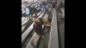 Drunk Girl Falls at Stadium