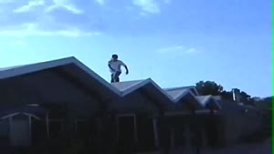 Skater Roof Jump Faceplant