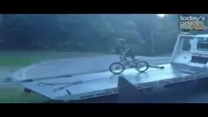 BMX Kid Faceplants Off Tow Truck