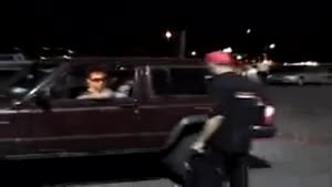 Guy Gets Knocked Out While Driving By Random Dude
