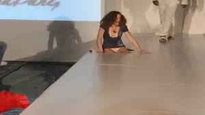 Model Falls Through Runway