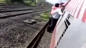 Guy Falls Off Overloaded Train