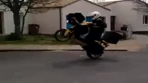 Postman Attempts Wheelie