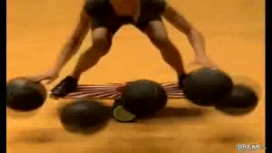 Girl On Indo Board Dribbles Five Balls At Once