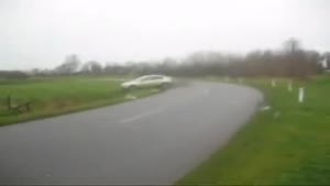 Car Skids Into Ditch