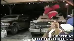 Drunk Santa Falls Off Roof