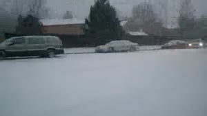 Cars Pile Up On A Very Snowy Hill