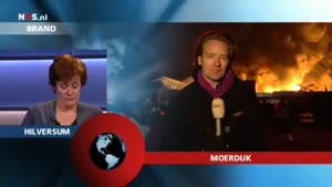 Massive Explosion Behind Dutch Reporter