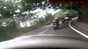 Car Vs. Bike Crash On Tight Road In Taiwan