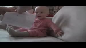 Baby Laughs hysterically Over Tearing Up Paper.
