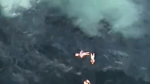 Helicopter Rescues Crew From Sinking Ship