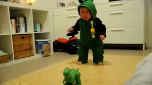 Little Boy Scared By Dinosaur