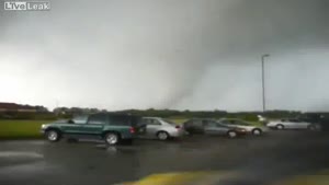 Guy Tries To Stay Cool As A Tornado Whizzes By