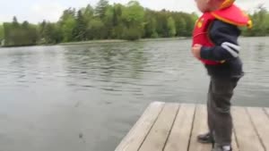 Little Boy Catches First Fish
