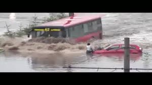 Riding A Bus Through The Flood