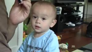 Baby Plays The Harmonica