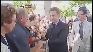 Sarkozy Rudely Grabbed During Visit
