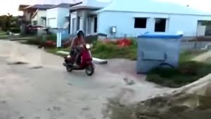 Moped Jump On Pile Of Sand