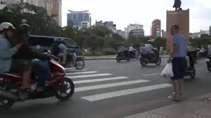 Crossing The Street In Vietnam