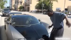 Dude Trips Over Bugatti Veyron