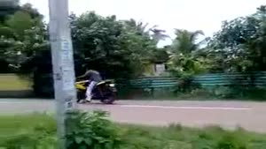 Wheelie Practicing Bike Rider Causes Accident