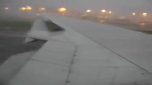 Plane Takes Off In Heavy Storm