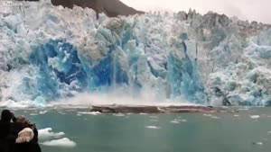 Tourist Boat Gets Too Close To Collapsing Glacier