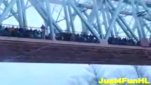 Crowd Jumps Off A Bridge Together