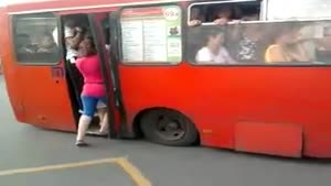 Girl Squeezes Herself In Overcrowded Bus