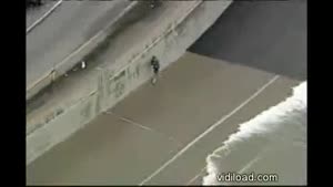 Huge Waves Takes Out Passers By