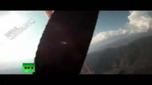 Paraglider Has An Encounter With A Bird