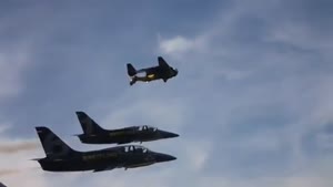 Jetman Flies Alongside Jet Fighters