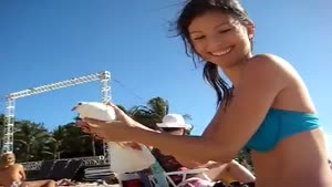 Bikini Girl Catches White Dove With Her Feet